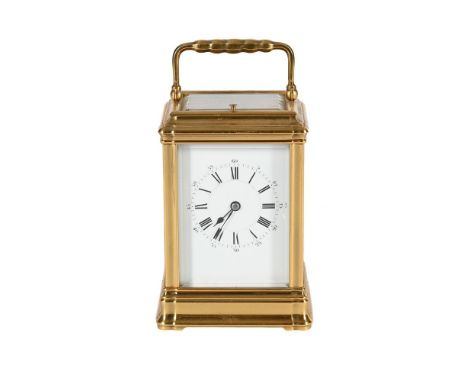 A BRASS CASED REPEATING CARRIAGE CLOCK  EARLY 20TH CENTURY With eight-day push-button repeating movement and Roman numeral di