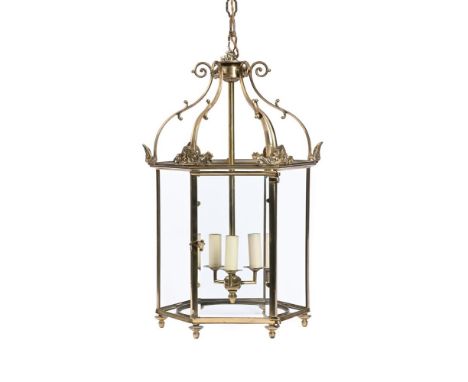 A GILT BRASS HALL LANTERN IN REGENCY STYLE  20TH CENTURY  Of hexagonal tapering form, with triple light fitting to the interi