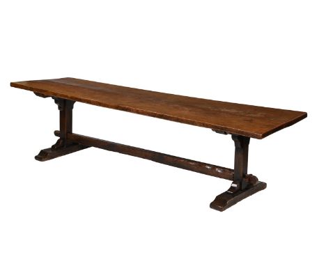 AN OAK REFECTORY TABLE INCORPORATING SOME EARLY 18TH CENTURY ELEMENTS 74cm high, 288cm long, 81cm wide  Condition Report:  Th