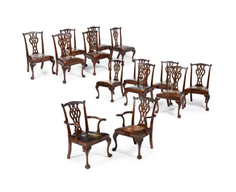 A SET OF FOURTEEN MAHOGANY DINING CHAIRS LATE 19TH OR EARLY 20TH CENTURY, IN CHIPPENDALE STYLE The two armchairs 98cm high, 6