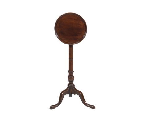 A MAHOGANY SMALL PEDESTAL TABLE  EARLY 19TH CENTURY  The moulded circular top on slender column and tripod legs 78cm highProv