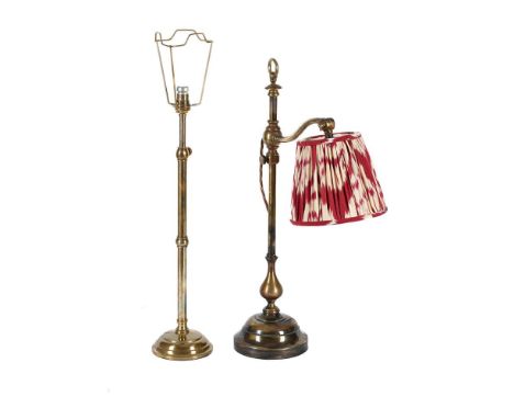 TWO BRASS TABLE LAMPS  20TH CENTURY One a 'student's lamp' with a Robert Kime Ikat style shade, 62cm high The other another t