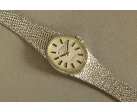 A ROTARY LADY'S MANUAL WRISTWATCH, c.1973, in 9ct white gold case, signed 21 jewelled lever movement, signed oval satin silve