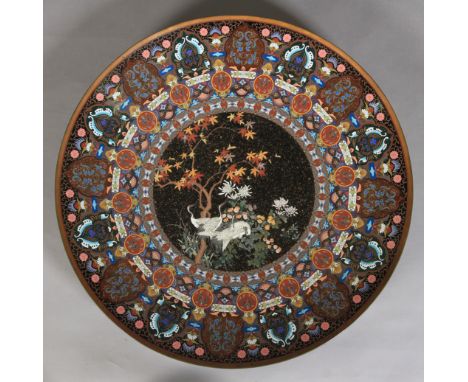 A VERY LARGE JAPANESE CLOISONNE ENAMEL CIRCULAR CHARGER, the circular central panel finely worked with four white cranes amid