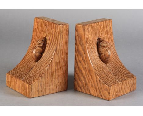 THOMPSON OF KILBURN 'MOUSEMAN' PAIR OF OAK BOOKENDS, both carved in relief with a mouse, 15cm high x 10cm wide. See illustrat