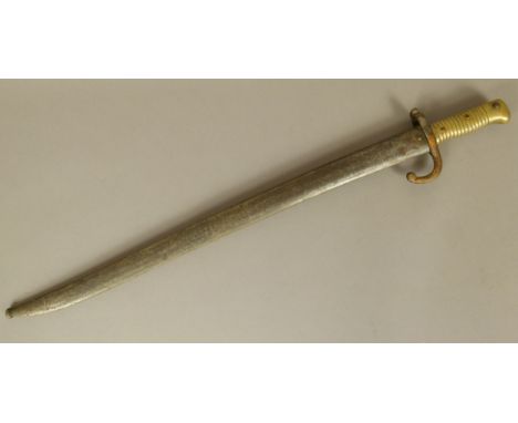 A FRENCH MODEL 1866 CHASSEPOT BAYONET, the iron crossguard numbered *758, single hooked quillon, brass hilt, wide fullered bl