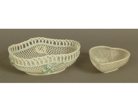 A BELLEEK BASKET, oval with undulating rim, the body applied with sprays of flowers in pale blue and green, applied banners i