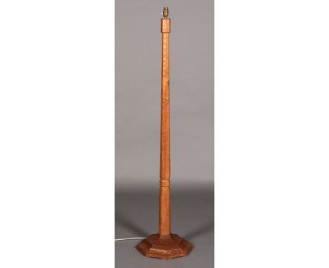 THOMPSON OF KILBURN 'MOUSEMAN' AN OAK STANDARD LAMP, the octagonal tapered column on a stepped octagonal base carved in relie