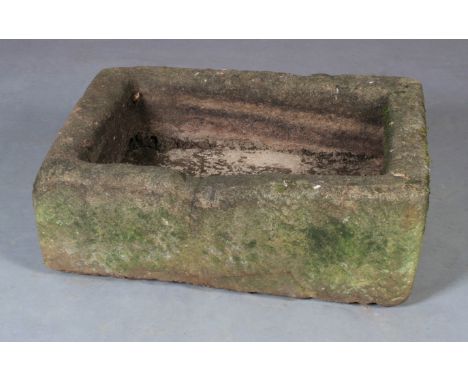 A NATURAL STONE TROUGH, rectangular 73cm long x 53cm wide x 29cm high. See illustration 