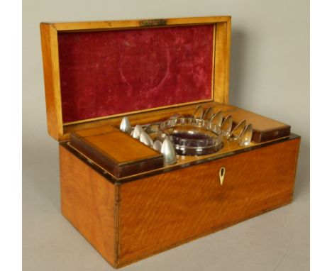 A GEORGE III SATINWOOD VENEERED TEA CADDY of rectangular form, the hinged lid with engraved mother of pearl oval, line inlaid