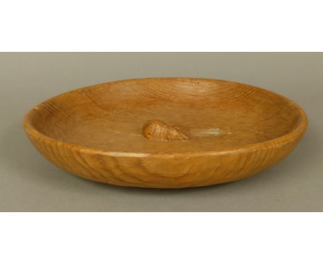 THOMPSON OF KILBURN 'MOUSEMAN' AN OAK FRUIT BOWL, circular, carved in relief with a mouse to the centre, 29cm diameter 