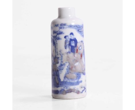 A Chinese copper-red and underglaze blue snuff bottle, late Qing dynasty, of tapering form, painted with a man hunting a deer