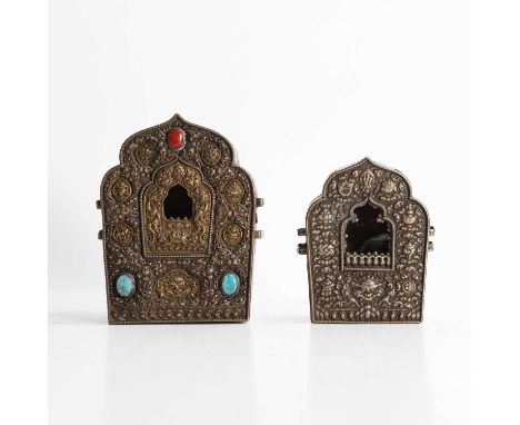 Two Tibetan copper and white-metal travel shrines, 19th century, of pentagonal ogival form, one inset with semi-precious ston