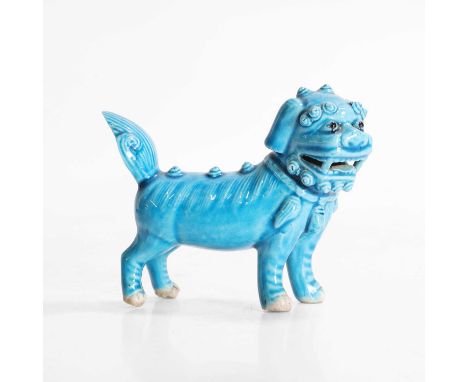 A Chinese turquoise-glazed model, late Qing dynasty, of a Buddhist lion, 10cm longCondition ReportSmall chips to edge of tail