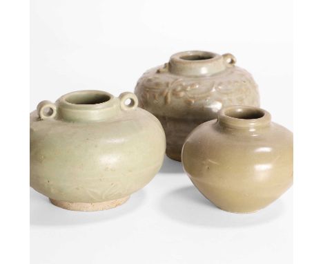 A collection of Chinese celadon jarlets, Yuan to Ming dynasties, including two decorated with lotus in relief and with loop h