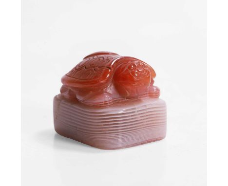 A Chinese agate seal, Republic period (1912-1949), the finial in the shape of a tortoise, carved 'Xue Gu Tang' to the seal fa