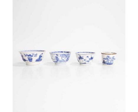 A collection of Chinese blue and white teacups, Kangxi (1662-1722), each painted with figures or cranes, 5 to 8.7cm diameter 