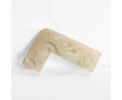 A Chinese jade carving, Yuan dynasty (1271-1368), carved with a chilong, 7cm longProvenance: Purchased by the grandparents of