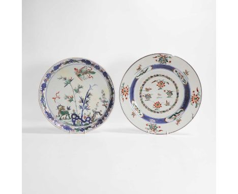 Two Chinese wucai chargers, Kangxi (1662-1722), one painted with mandarin ducks in a lotus pond, the other with a qilin and a