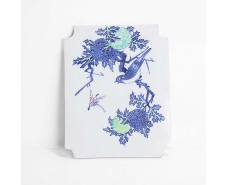 A Chinese doucai porcelain panel, Republic period (1912-1949), of shaped rectangular form, painted with a magpie and a butter