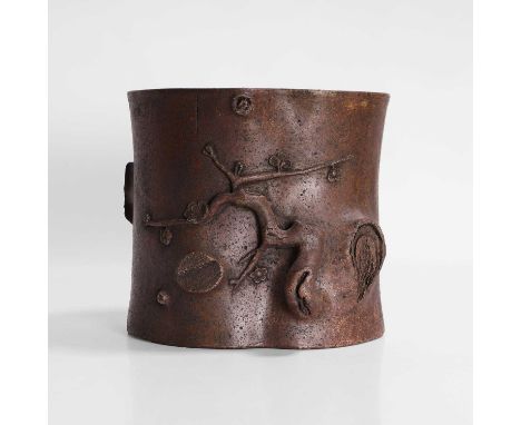 A Chinese stoneware brush pot, 20th century, in the shape of a gnarled tree with blossoming prunus branches, a two-character 