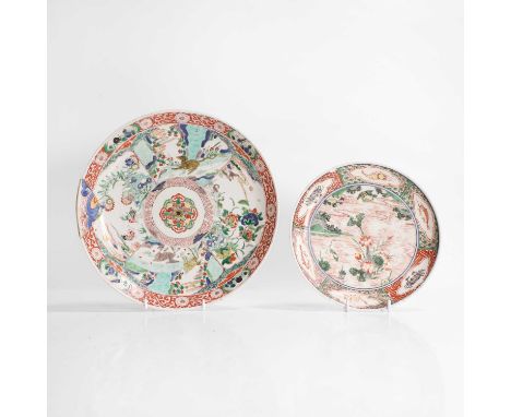 Two Chinese wucai plates, Kangxi (1662-1722), each of circular form, one painted with an egret standing in a lotus pond, the 