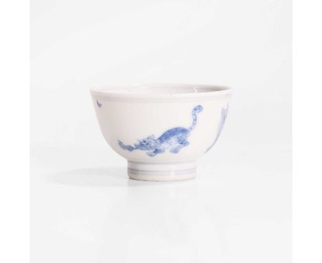 A Chinese blue and white cup, Kangxi (1662-1722), the rounded sides rising from a circular foot, painted with cats, with a si