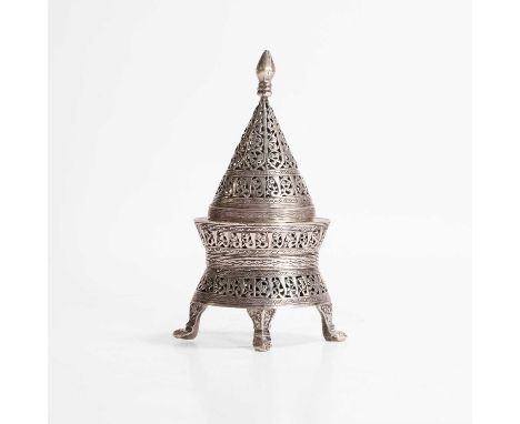 A Persian white-metal container and cover, c.1900, the cover of oval, conical form with bands of pierced foliate decoration a
