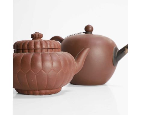 Two Chinese Yixing stoneware teapots, Qing dynasty (1644-1911), comprising:one lobed, in the shape of a chrysanthemum, 20cm l