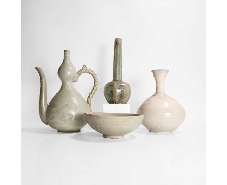A collection of Korean ceramics, possibly 19th century, comprising a celadon-glazed bowl and vase, a double gourd ewer and a 