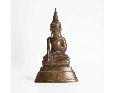 A Burmese bronze Buddha, 19th century, modelled seated with his hands in Bhumisparsa mudra, the robes and facial features eng