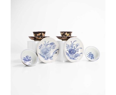 A collection of Chinese cups and saucers, Qing dynasty (1644-1911), including a pair of Chinese Imari, decorated with red and
