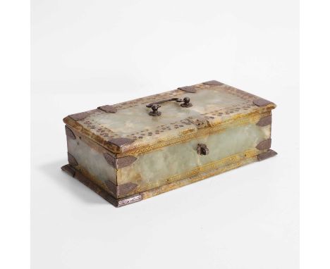 An Indian carved jade box, 19th century, the silver-mounted box with foliate polychrome and gilt decoration, the hinged top r