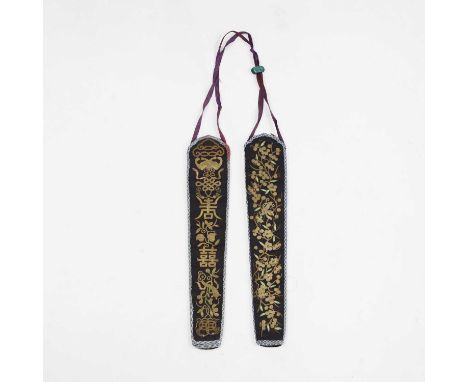 A pair of Chinese embroidered fan cases, late Qing dynasty, one decorated with a butterfly in a blossoming prunus tree, the o