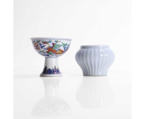 A Chinese clair-de-lune-glazed jar, 20th century, of ribbed baluster form, 8.5cm diameter, and a wucai stem cup,decorated wit