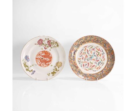 Two Chinese famille rose plates, late Qing dynasty, comprising:one with a dragon roundel to the centre, with a six-character 