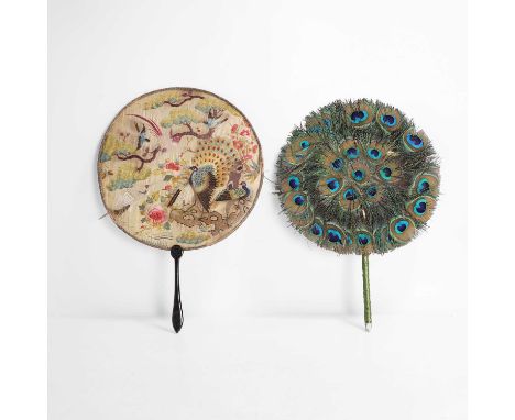 A Chinese embroidered fan, 19th/20th century, of circular form, decorated with peacocks standing on a rock by peony under a p