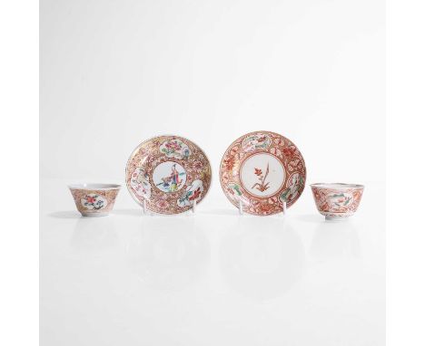 Two pairs of Chinese export famille rose cups and saucers, 18th century, each painted with figures or flowers against a gold 