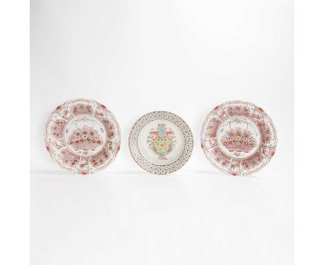 A pair of Chinese export wucai plates, Qing dynasty (1644-1911), each of lobed form, painted with a basket of flowers to the 