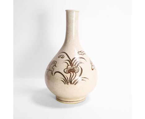 A Korean porcelain vase, possibly early 20th century, the pear-shaped body rising from a circular foot to a straight neck and