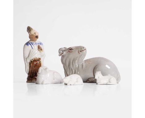 A collection of Japanese Hirado ware porcelain okimono, Meiji period (1868-1912), of a boar, a dog and a ram, 4.8 to 6.5cm lo