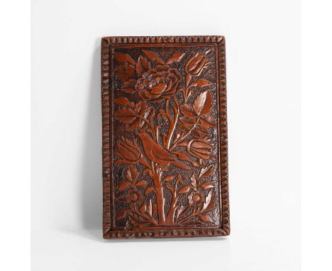 A Persian carved fruitwood mirror case, late 19th/early 20th century, each side carved in relief depicting a bird amongst flo