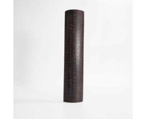 A Chinese wood wrist rest, 20th century, in the form of a scroll, inscribed with the poem 'Qiang Jin Jiu' by Li Bai, 34cm lon