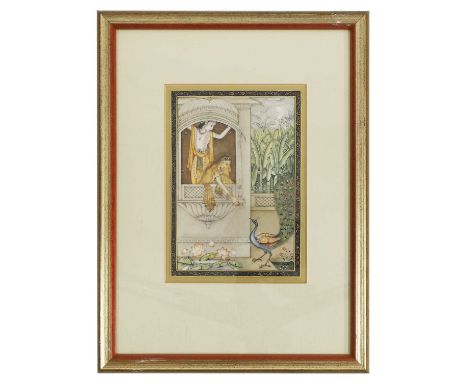 An Indian painted miniature on ivory,  late 19th/early 20th century, North India, of two ladies on a garden balcony, feeding 