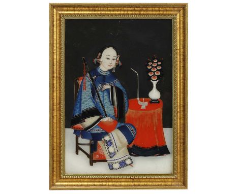 A Chinese reverse glass painting, late Qing dynasty, with a lady holding a vertical bamboo flute in her right hand, an opium 