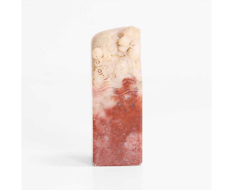 A Chinese soapstone seal, early 20th century, carved with a dragon chasing a flaming pearl, with carp ascending from spuming 