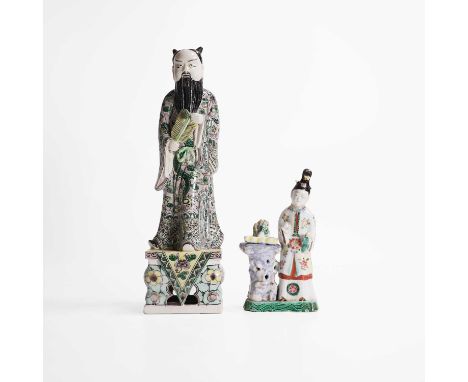 A Chinese porcelain figure, 18th century, of a lady standing by a planter,16.5cm high, and a famille verte figure, Republic p