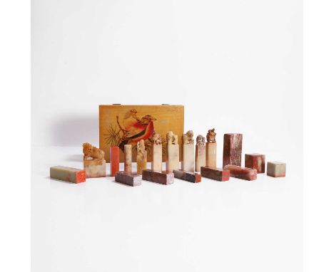 A collection of Chinese soapstone seals, 20th century, each of rectangular or cylindrical form, with eight carved with a fini