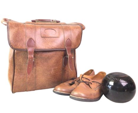 SET OF FOUR TYROLITE LAWN BOWLS, AND A SET OF FOUR LIGNOID LAWN BOWLS each contained in a carry bag and each with a pair of b