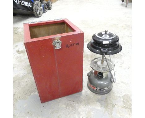 A Coleman The Powerhouse 295 unleaded storm light. 